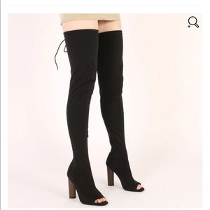 Black thigh high boots